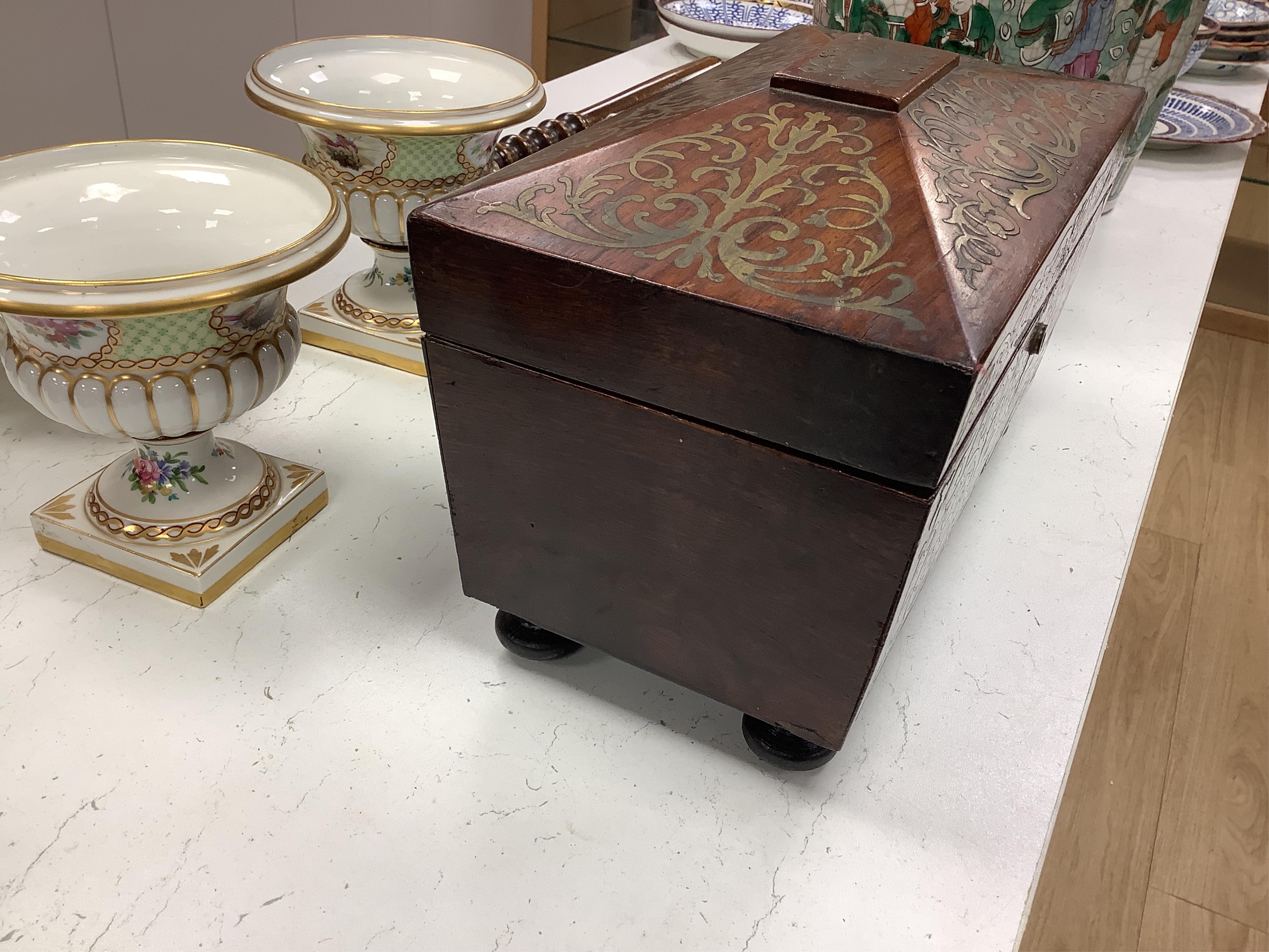 A William IV rosewood and cut brass inlaid tea caddy, 32cm wide